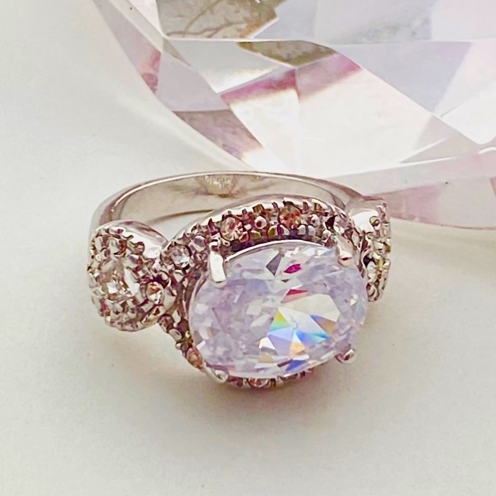 Silver plated and cubic zirconia ring. Size 6.5.
